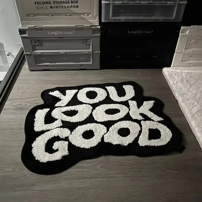 Irregular Letter Faux Cashmere Rug in Black