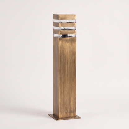 The bollard light at full height on a plain background