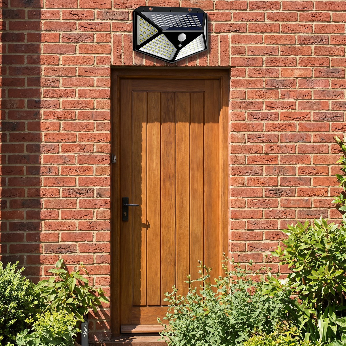 The same floodlight mounted above a back door in daylight