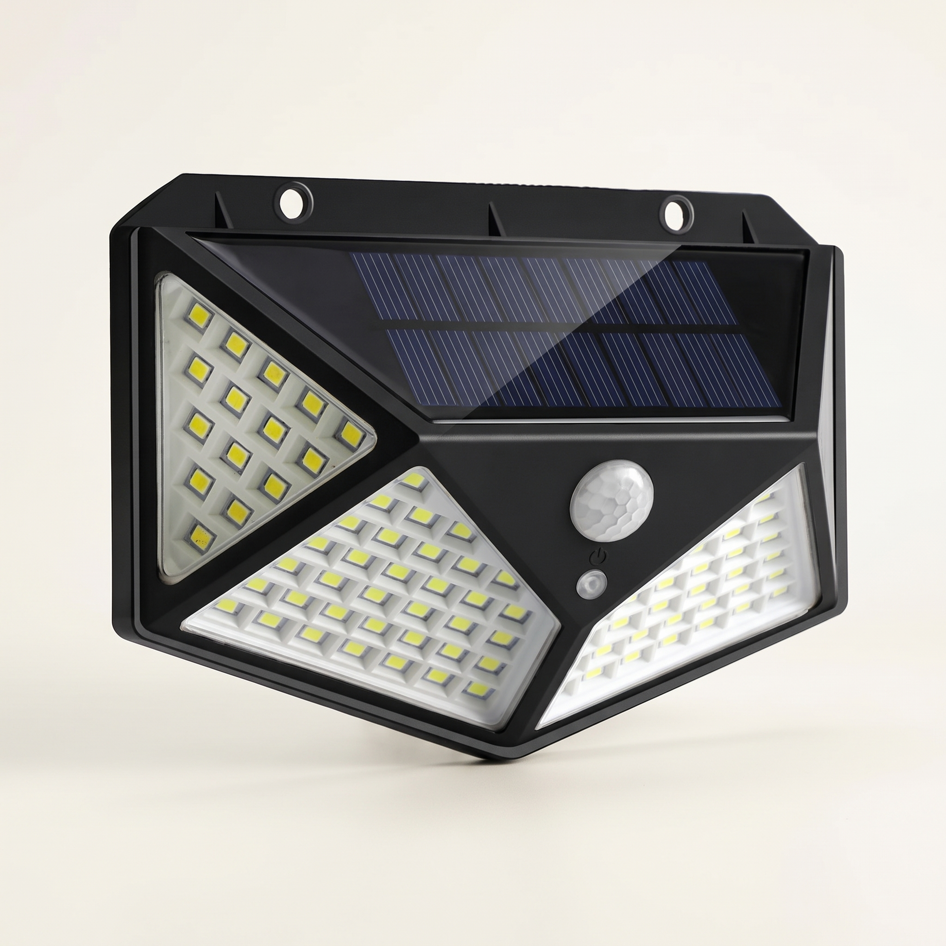 The solar floodlight on a plain background showing its panel and sensor