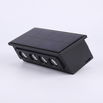 The solar up and down wall light on a plain background