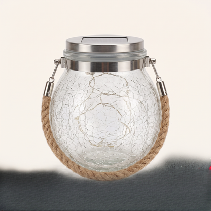 The crackle glass jar light with its rope handle, lights off