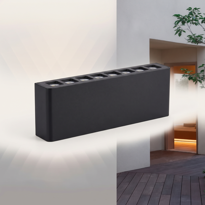 The up and down wall light shown close, LED openings visible