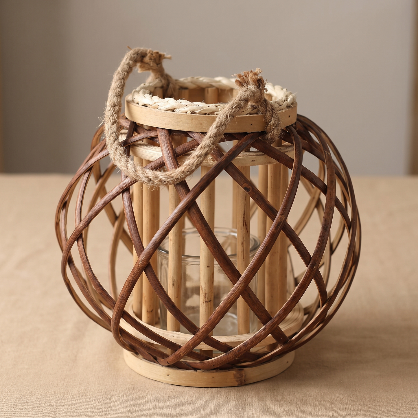 The wicker lantern unlit showing the weave, wooden base and rope handle