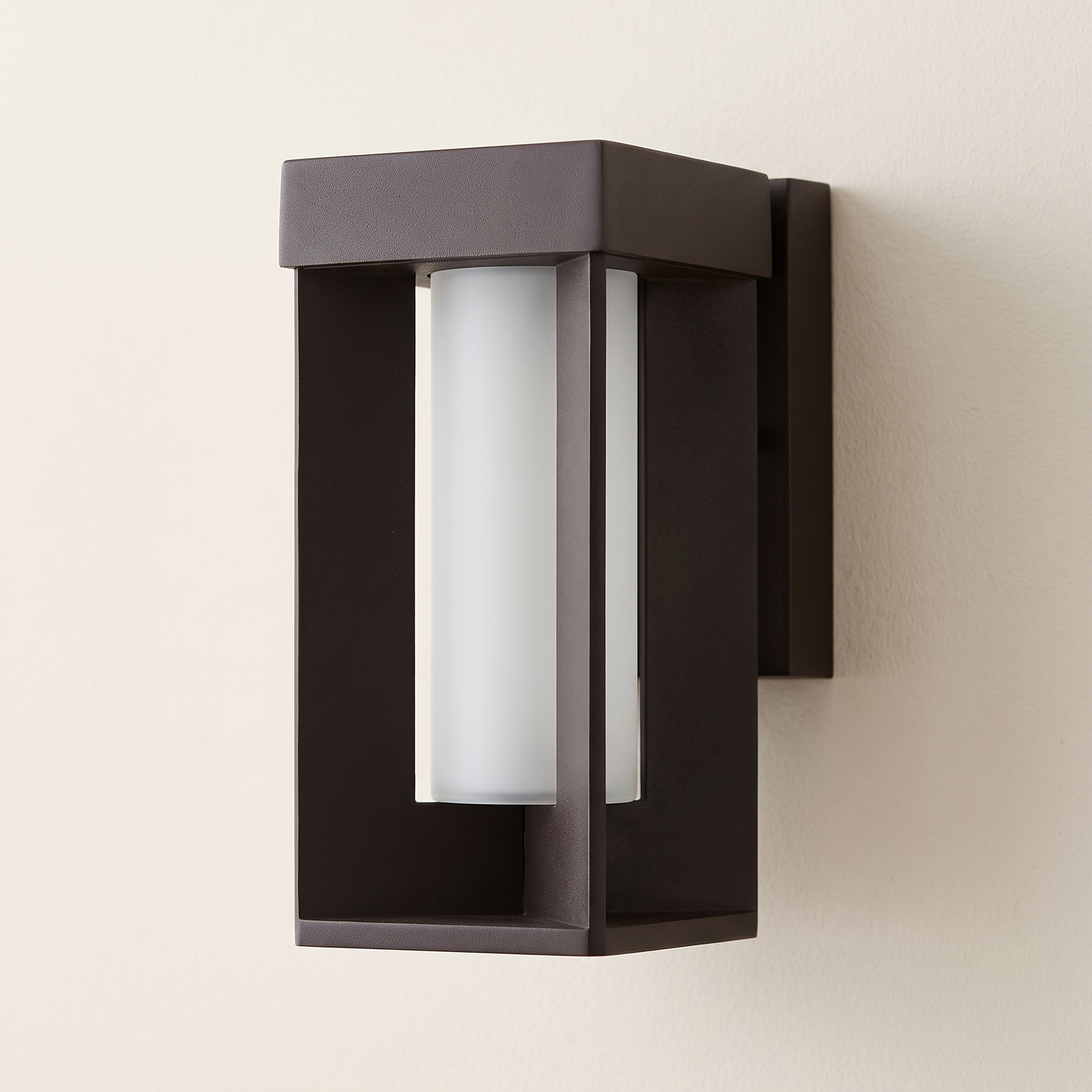 The framed lantern unlit showing its frame and frosted glass column