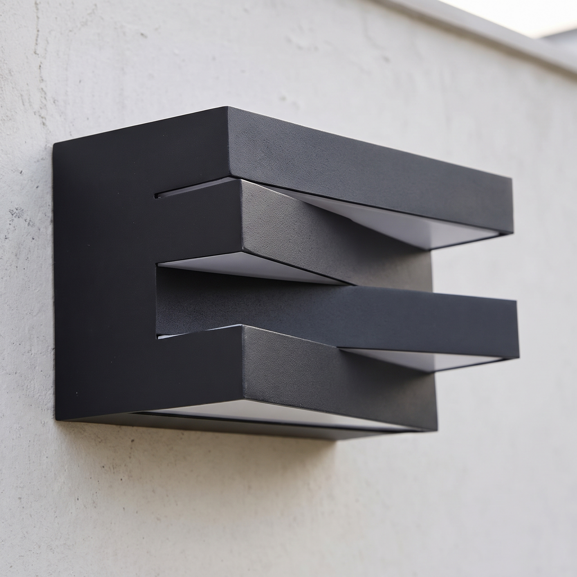 The slatted wall light unlit showing the horizontal slats across its face