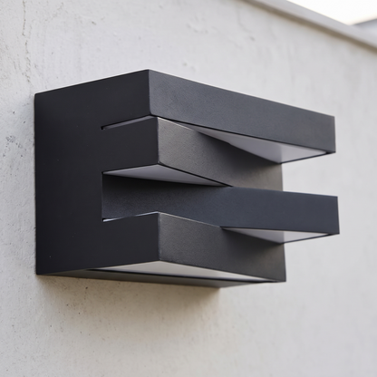 The slatted wall light unlit showing the horizontal slats across its face