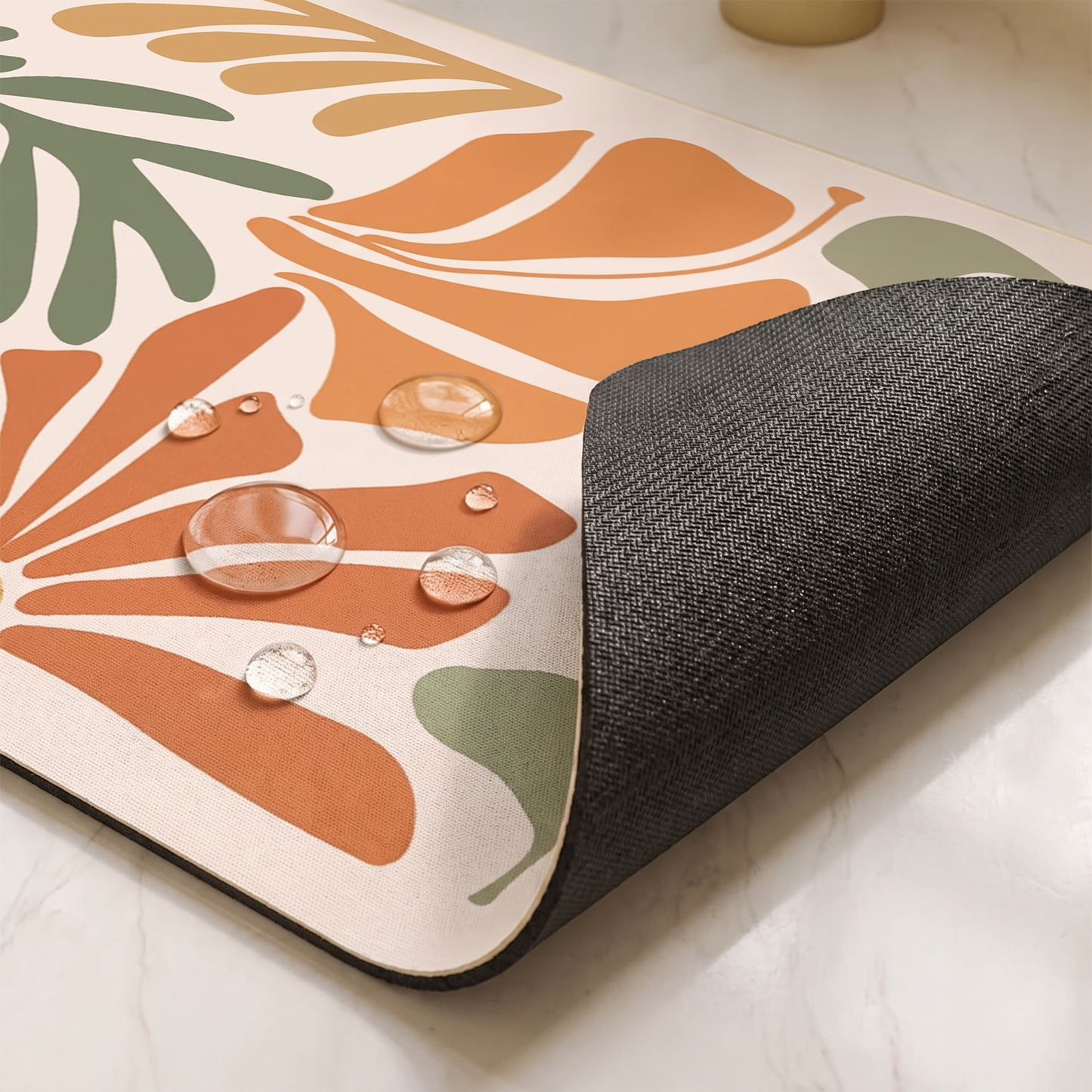 A corner of the mat lifted to show the rubber backing, with water beading on the face