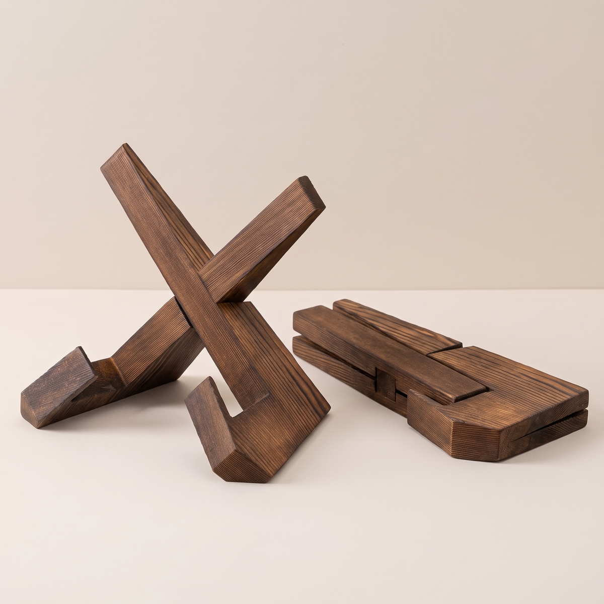 The stand shown open and folded flat side by side